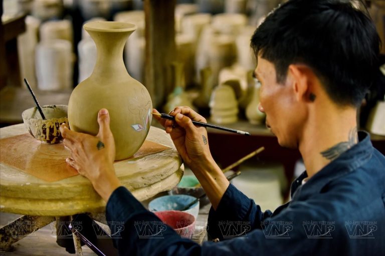 Handcrafted pottery by artisans at Phuoc Tich traditional craft village